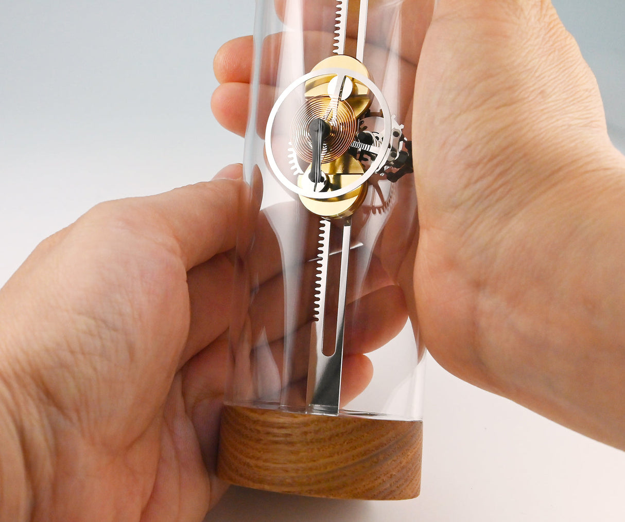 Mechanical oscilloglass Hands Close up