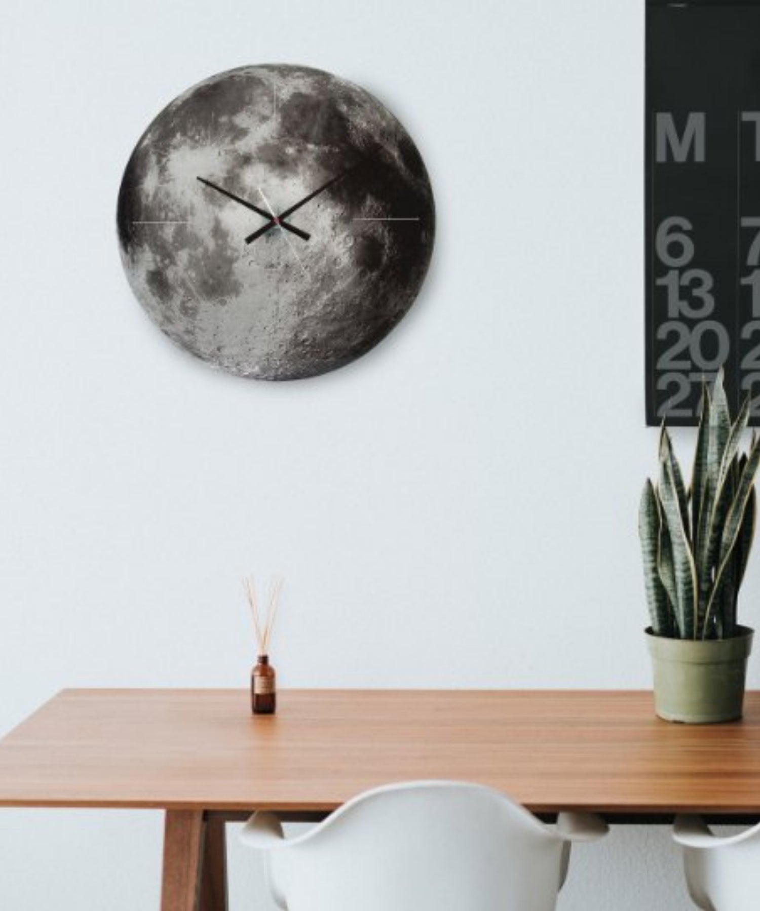 Glass Moon Clock on Wall
