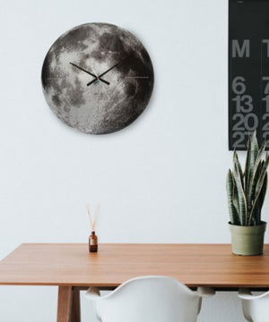 Glass Moon Clock on Wall