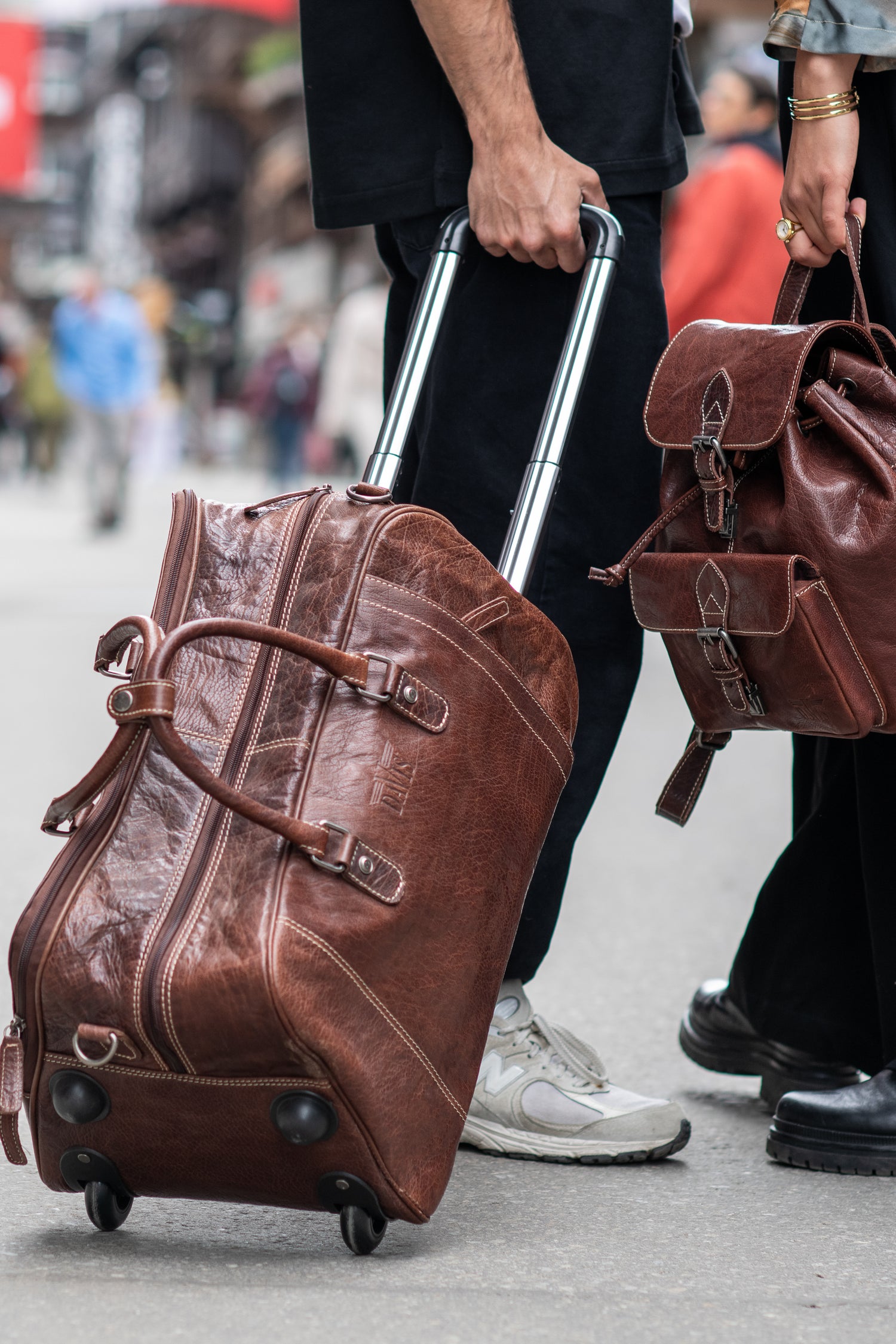 Leather Backpack and Trolley Bag street shot zoom