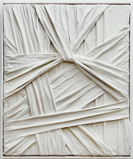 Grey sculptural wall art titled "Knot" by Sarah Kvejborg, resembling a twisted knot.