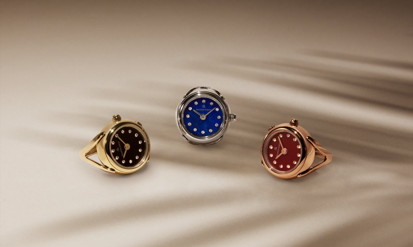 Editorial lifestyle image featuring 3 Maison Davis luxury ring watches