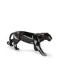 Side view of handcrafted glossy black porcelain panther sculpture made in Spain